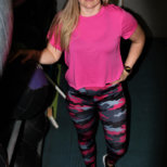 front of yelete pink camo leggings and pink crop top